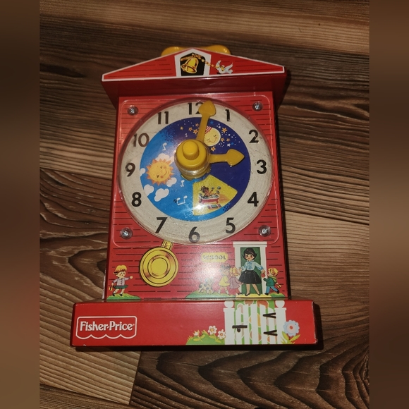 FisherPrice Toys Fisher Price Teaching Clock Poshmark
